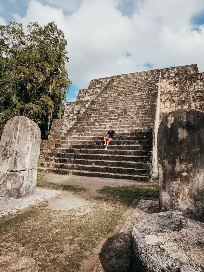 Ryan on stairs of the yaxha temple