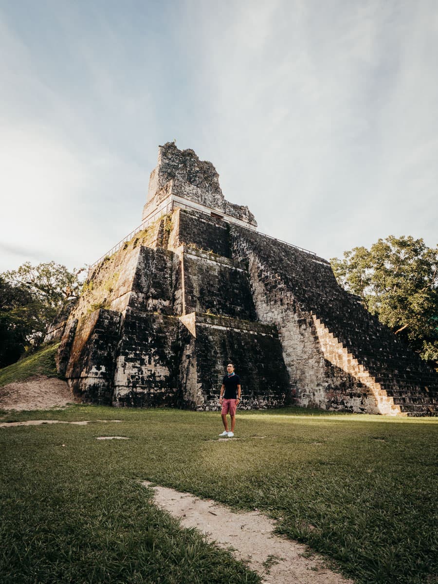 Man standing close to the main temple in Tikal