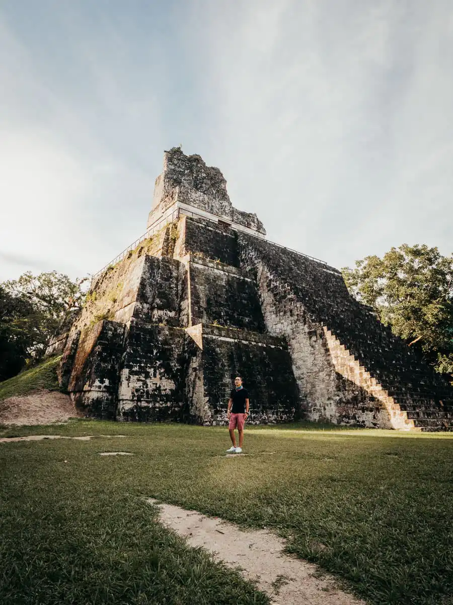Man standing close to the main temple in Tikal