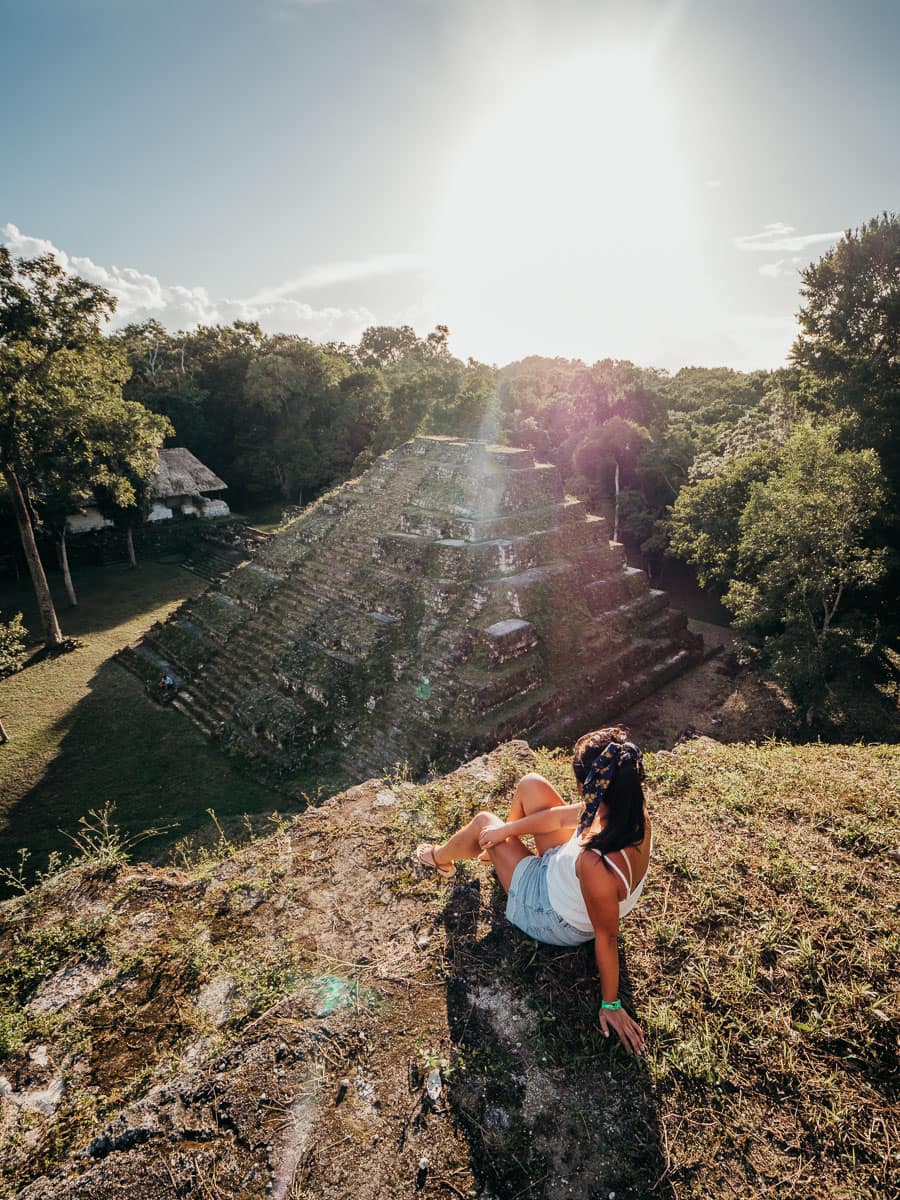 Sunset over a small temple in Yaxha