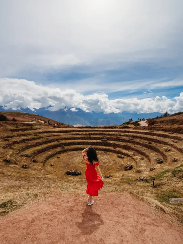 standing at the Moray circles during our Peru Itinerary