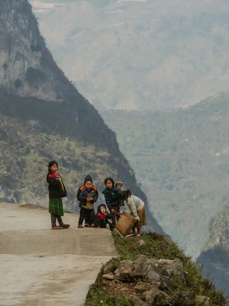 kids playing on the road in Ha Giang loop