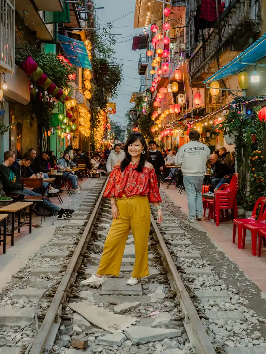 standing on the train tracks on the train street