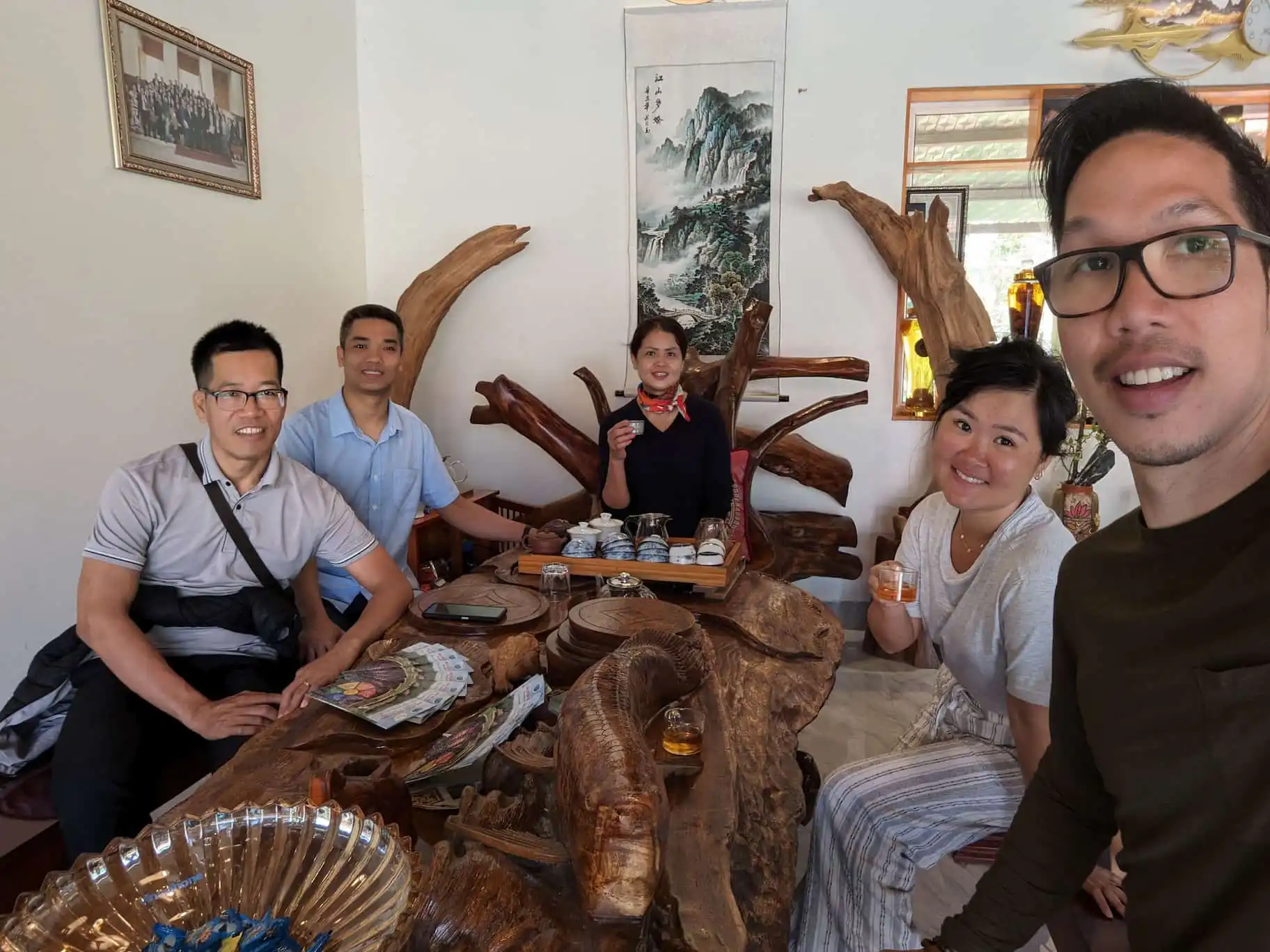 having tea with the owner of Kolia farm and our guide and driver