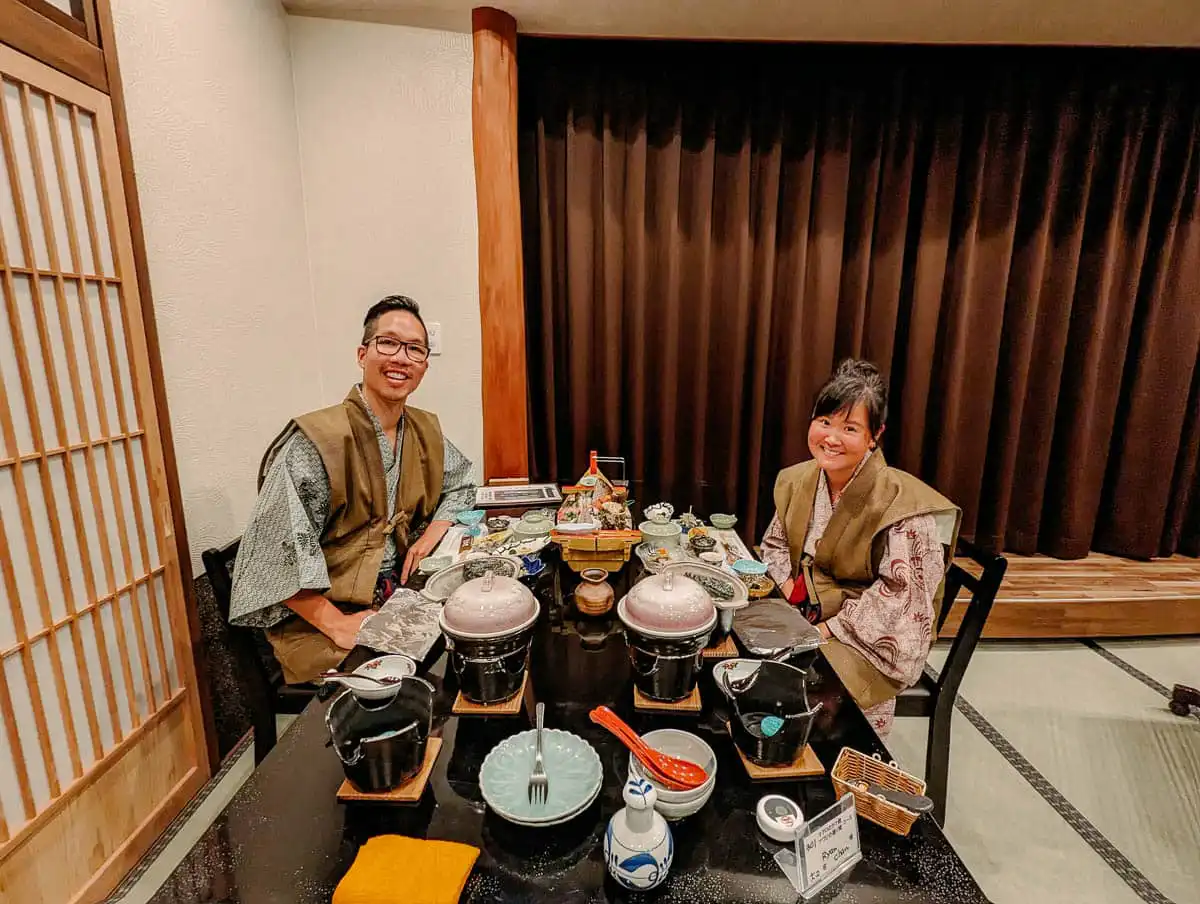 man and woman enjoying kaiseki japanese meal in izu peninsula. One of the best things to do in izu peninsula