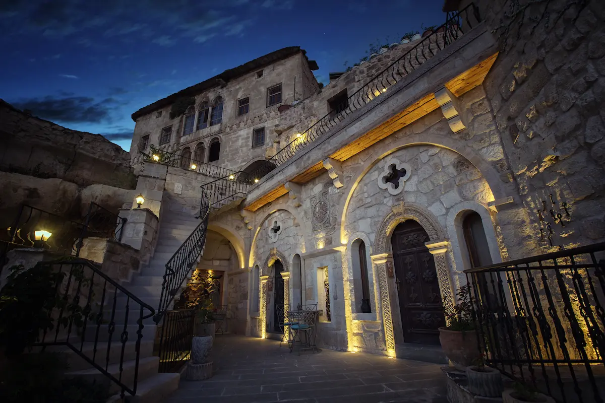 night lit view of palace at Elika Cave suites