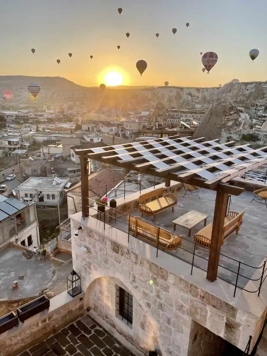 Luvi Cave hotel rooftop terrace with sunrise