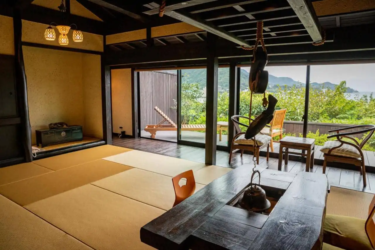 luxury ryokan with tatami room and view of outdoors