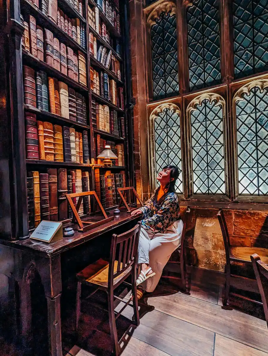 Sitting in the library of Hogwarts, part of our 10 day Japan travel Itinerary