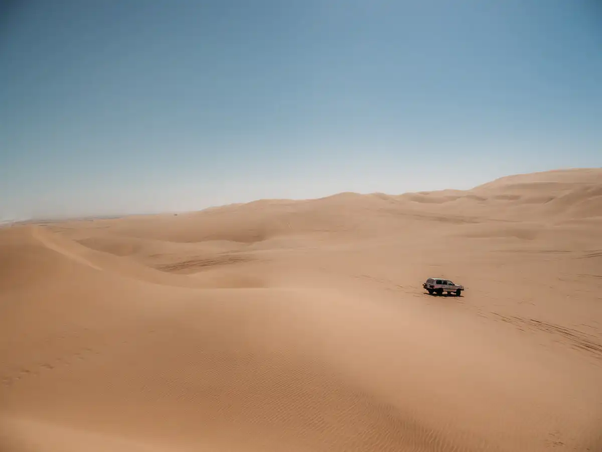 car driving into the dunes of Sandwich Harbour