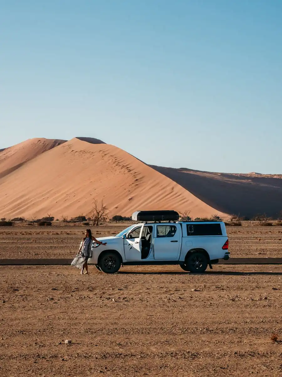 SUV at sand dunes of Sossusvlei