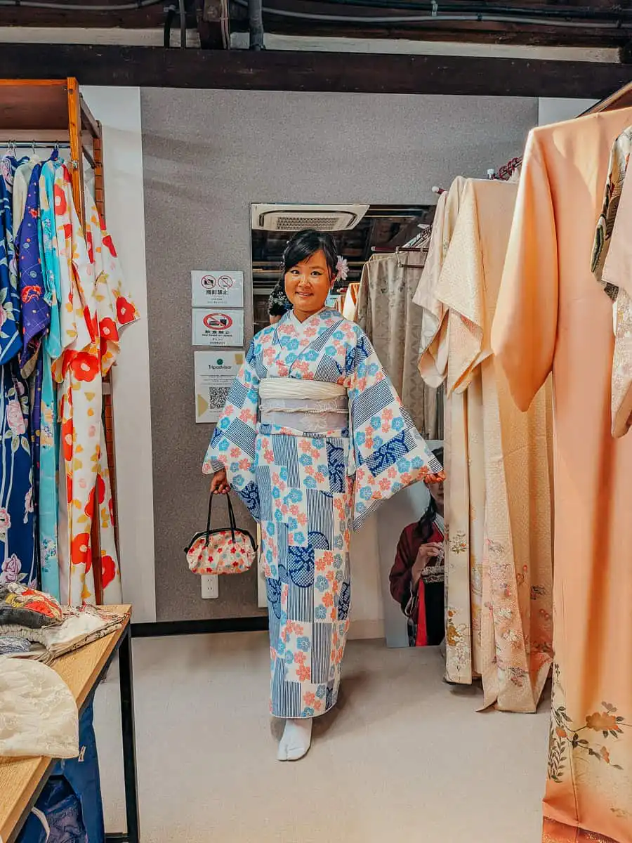 Woman dressed in kimono changing room