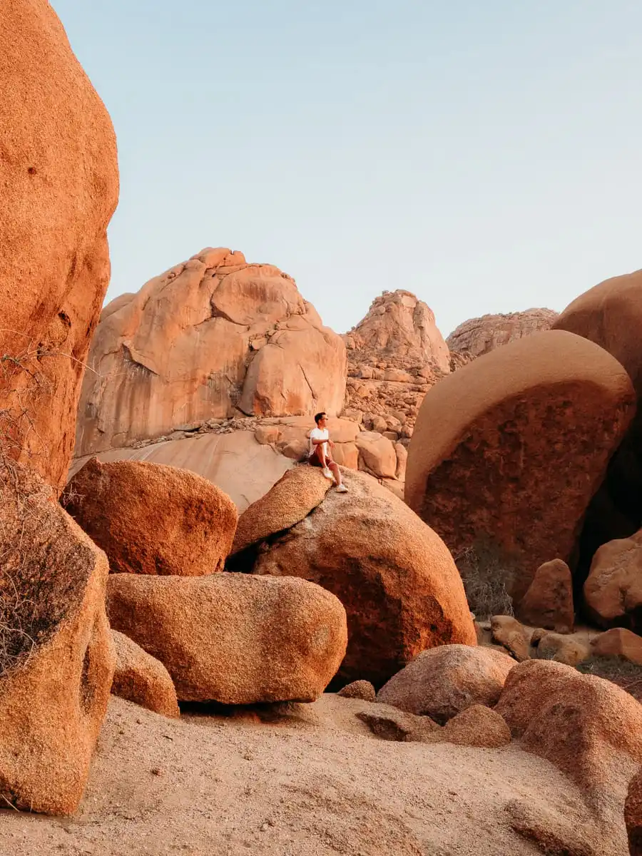 Sitting on the boulder in Spitzkoppe