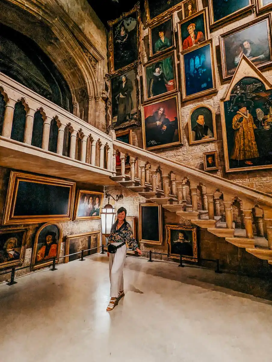 Woman standing in harry potter studio magic staircase