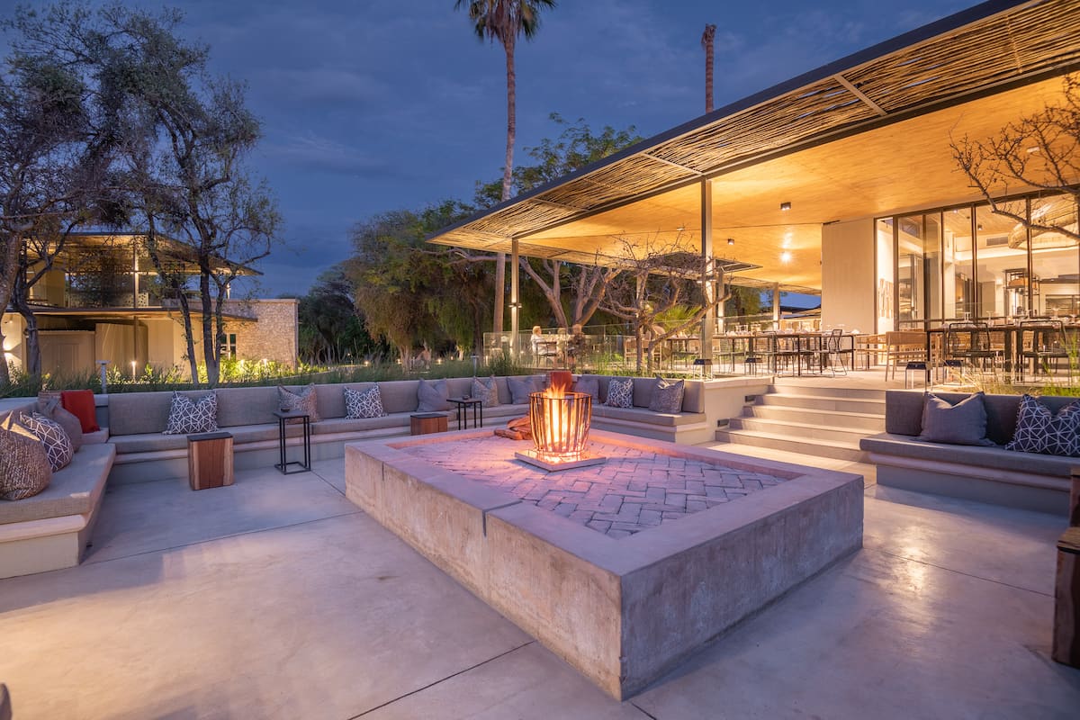 Lounge and fireplace at Mokuti Lodge