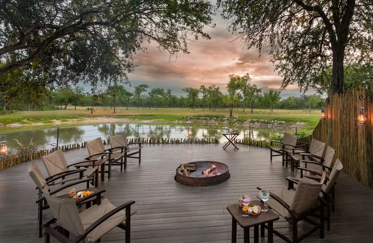 Onguma Lodge around campfire