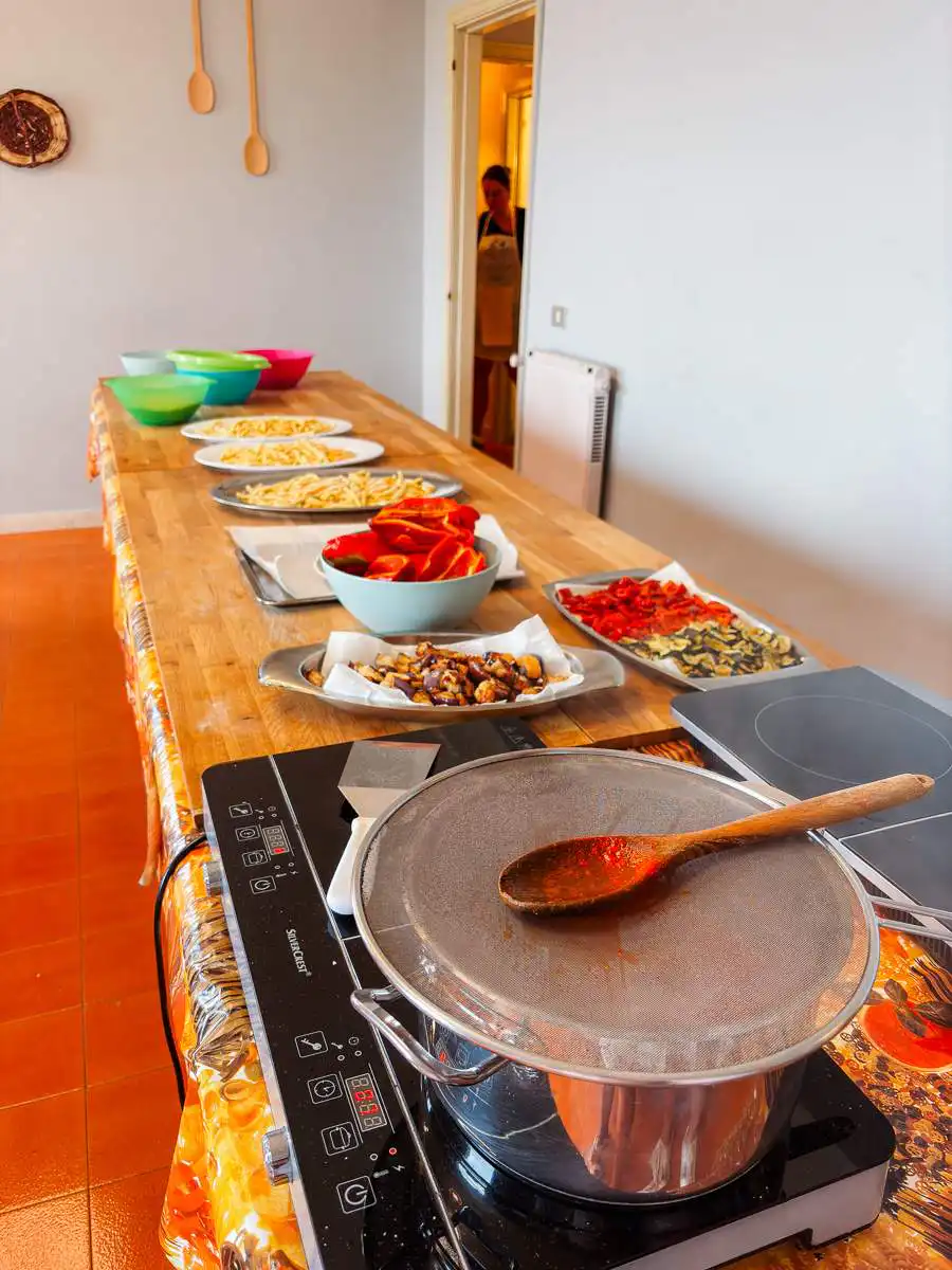 Kitchen prep during cooking class in Taormina