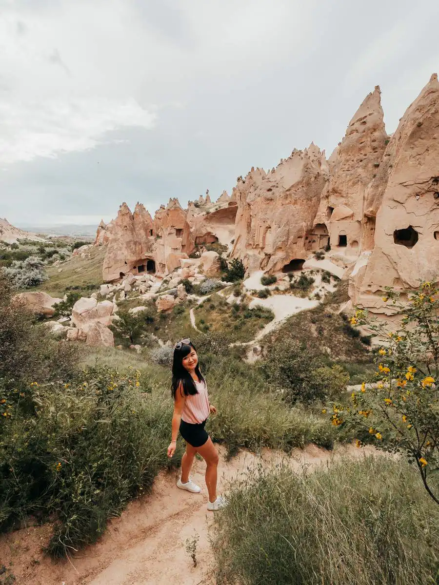 standing in Zelve Open Air Museum in Cappadocia