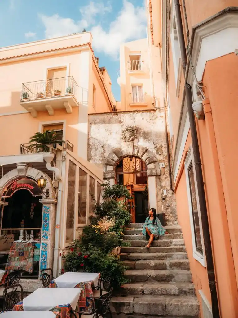 Sitting on the steps in Taormina during sunrise