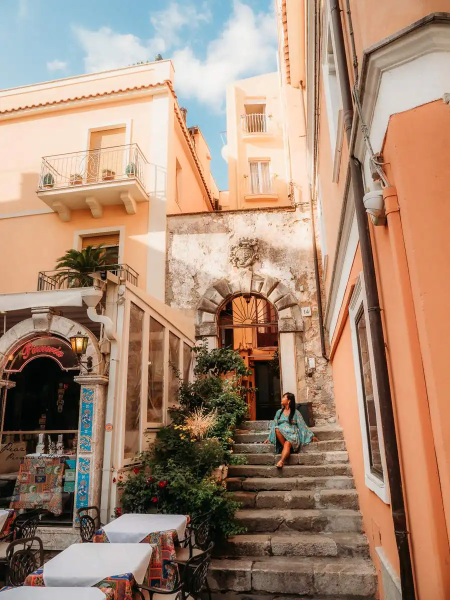Sitting on the steps in Taormina during sunrise