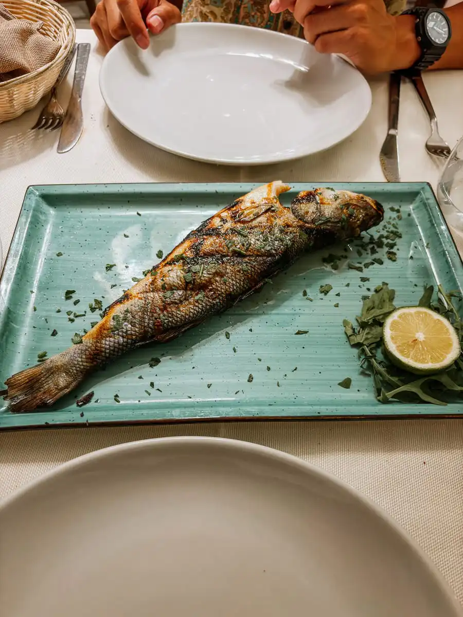 Grilled fish in restaurant in Catania