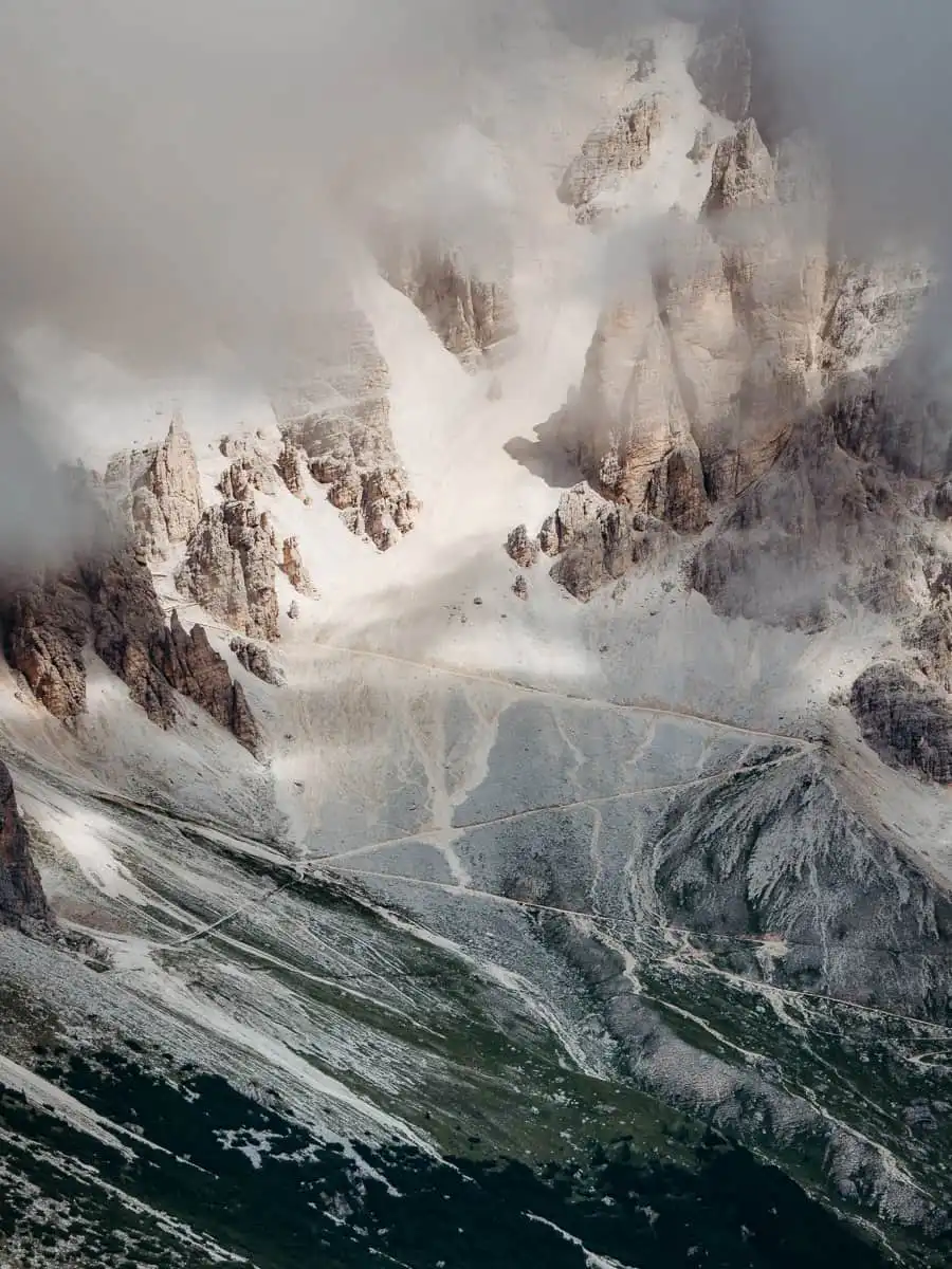 Zoomed in view of the mountain face and hiking path in the dolomites