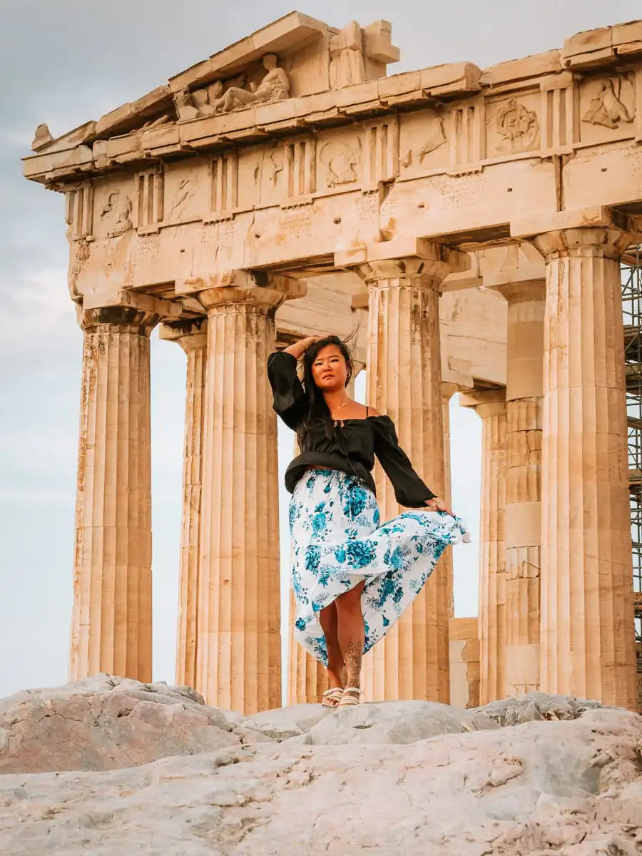 Woman standing in front of Parthenon