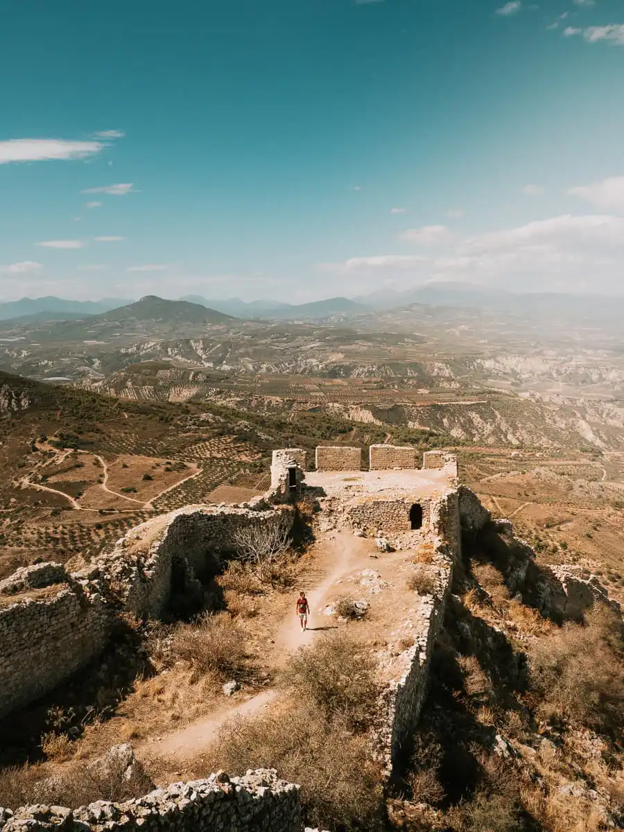 Man walking on the tower of acrocorinth fortress