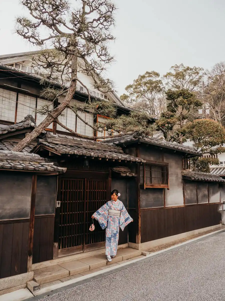 Walking in the streets of Kurashiki dressed in kimono, one of the best day trip from Osaka