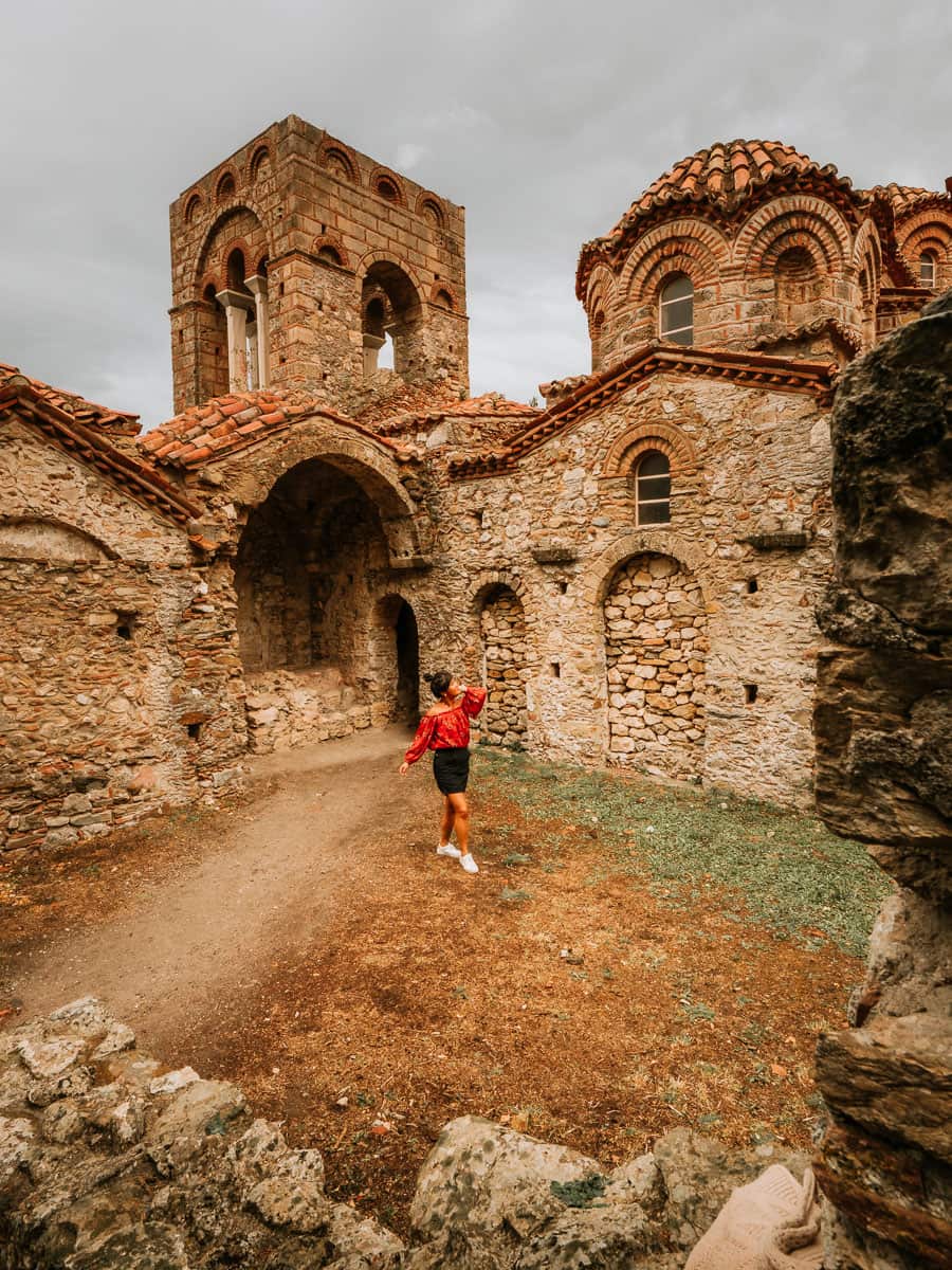 Standing in the courtyard of the ruins in Mystras