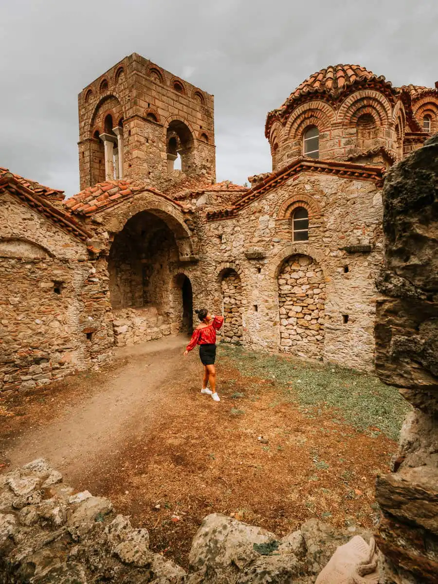 Standing in the courtyard of the ruins in Mystras