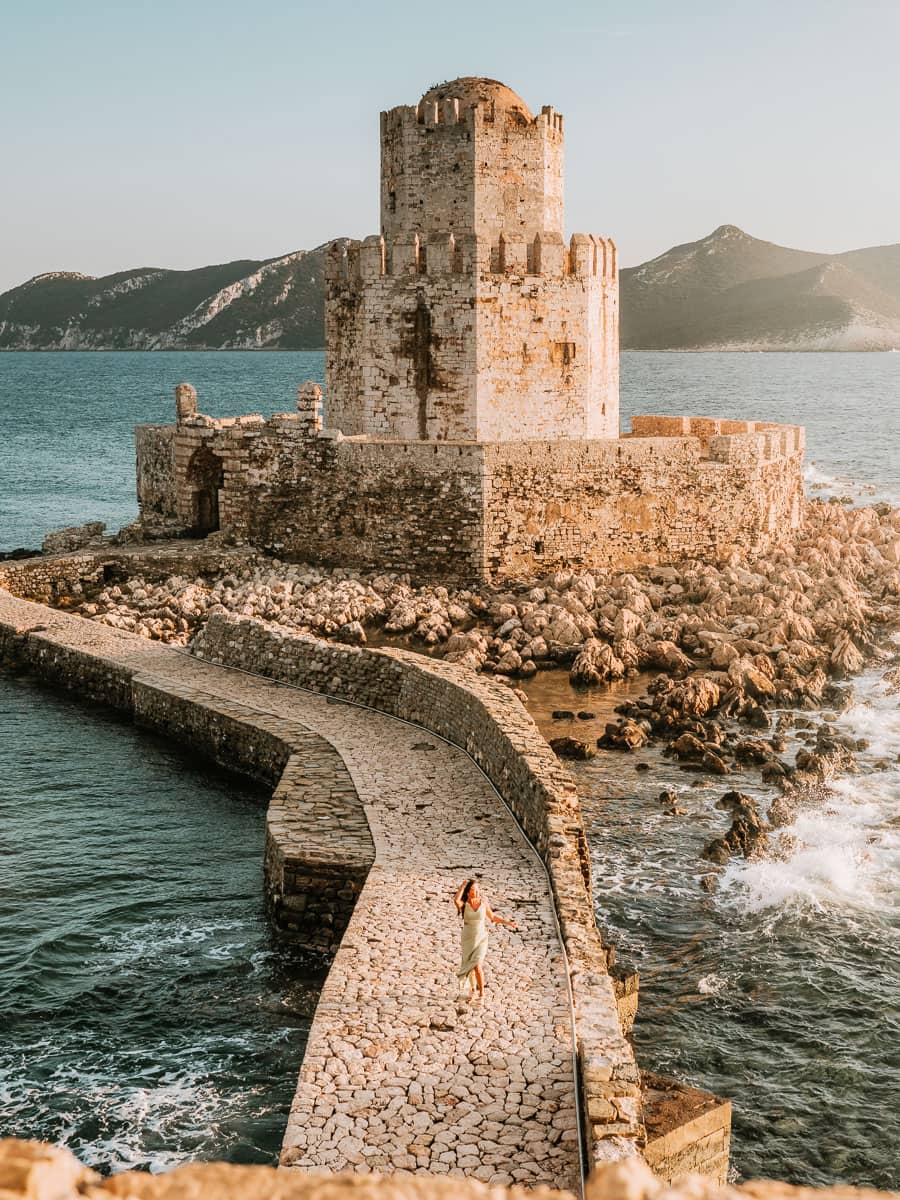 Walking along the bridge to Methoni castle