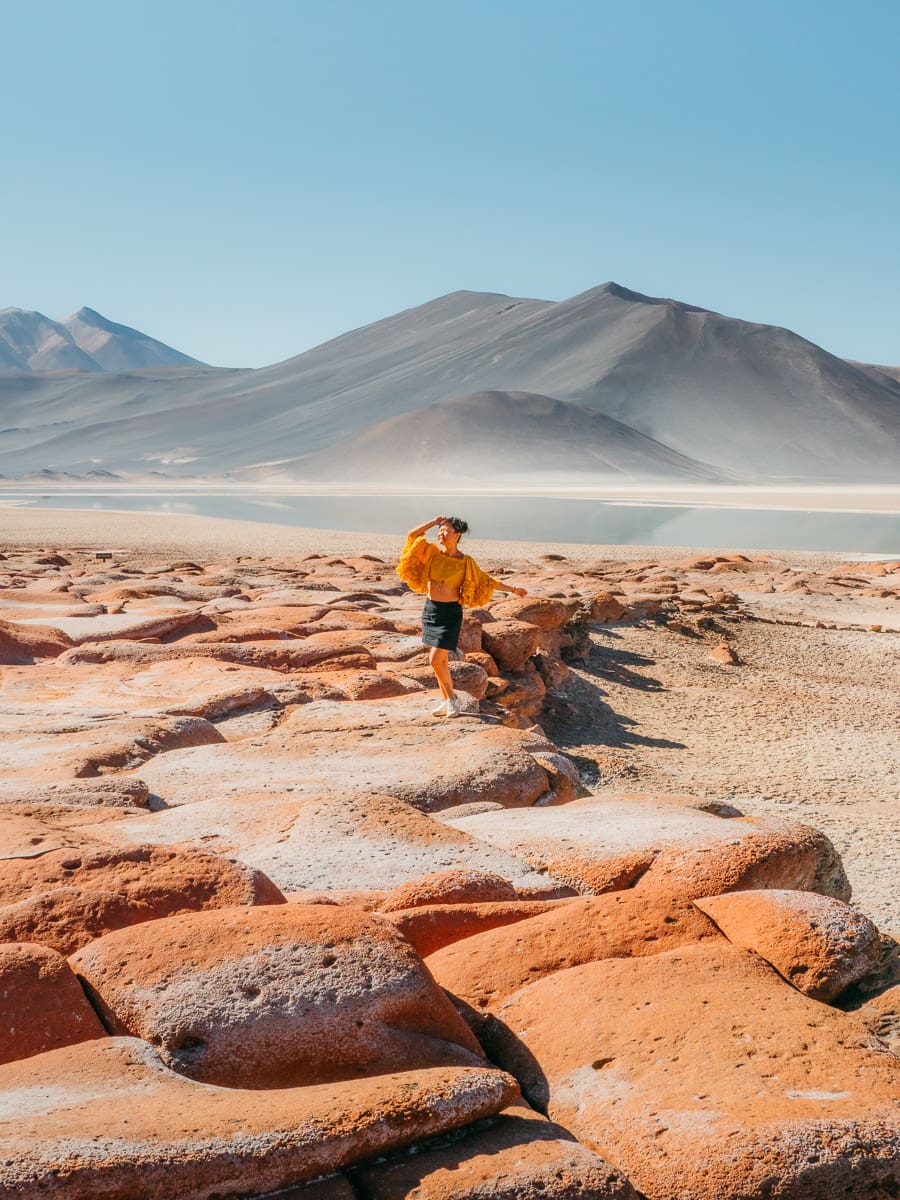 Woman standing with yellow dress at Piedras rojas