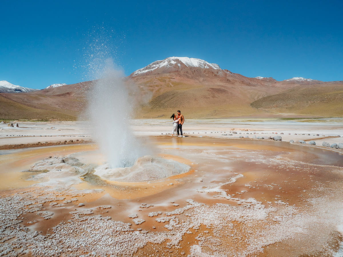 Standing in front of Geysers in El Tatio geyser