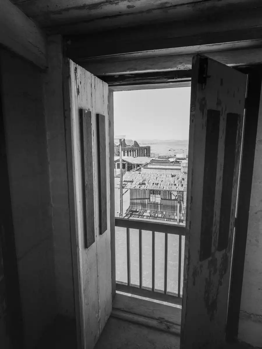Doorway showing the abandoned town of Chacabuco