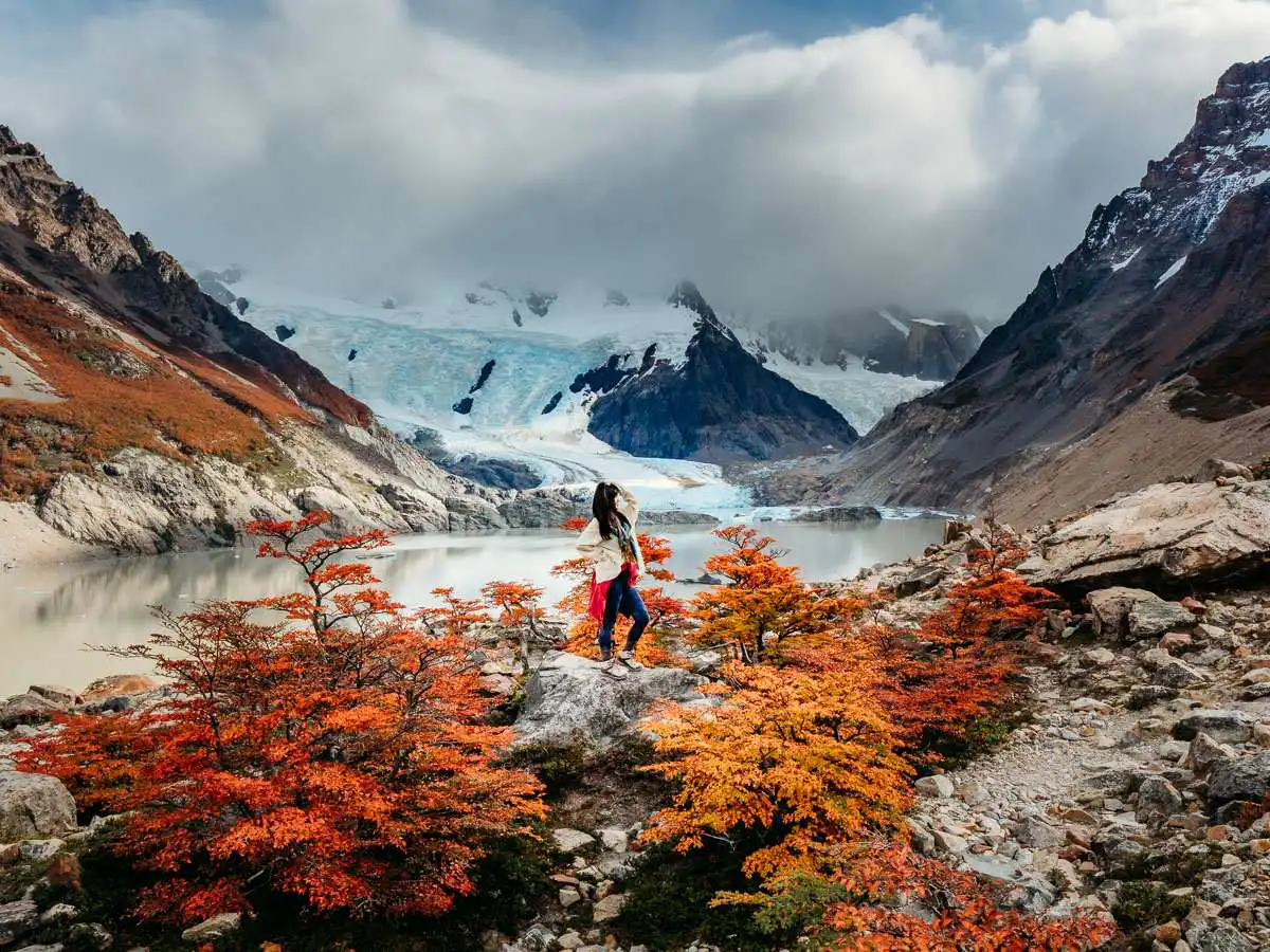 viewpoint with fall foliage during Laguna Torres hike in Argentina, one of our favourite views when comparing Chile Patagonia Vs. Argentina Patagonia