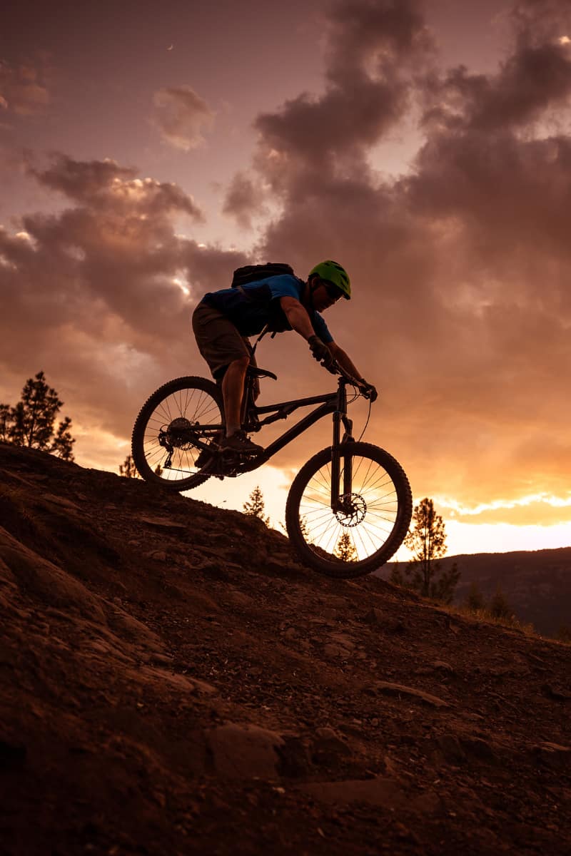 mountain biking at sunset