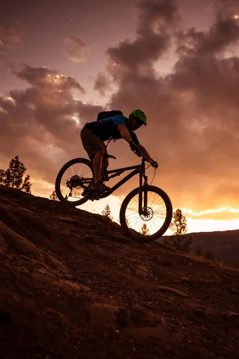 mountain biking at sunset