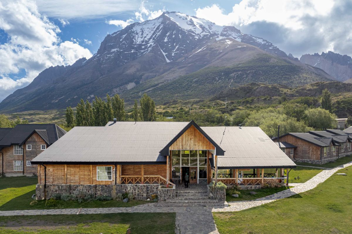 Las torres Patagonia hotel surrounded by the mountains in Torres del Paine