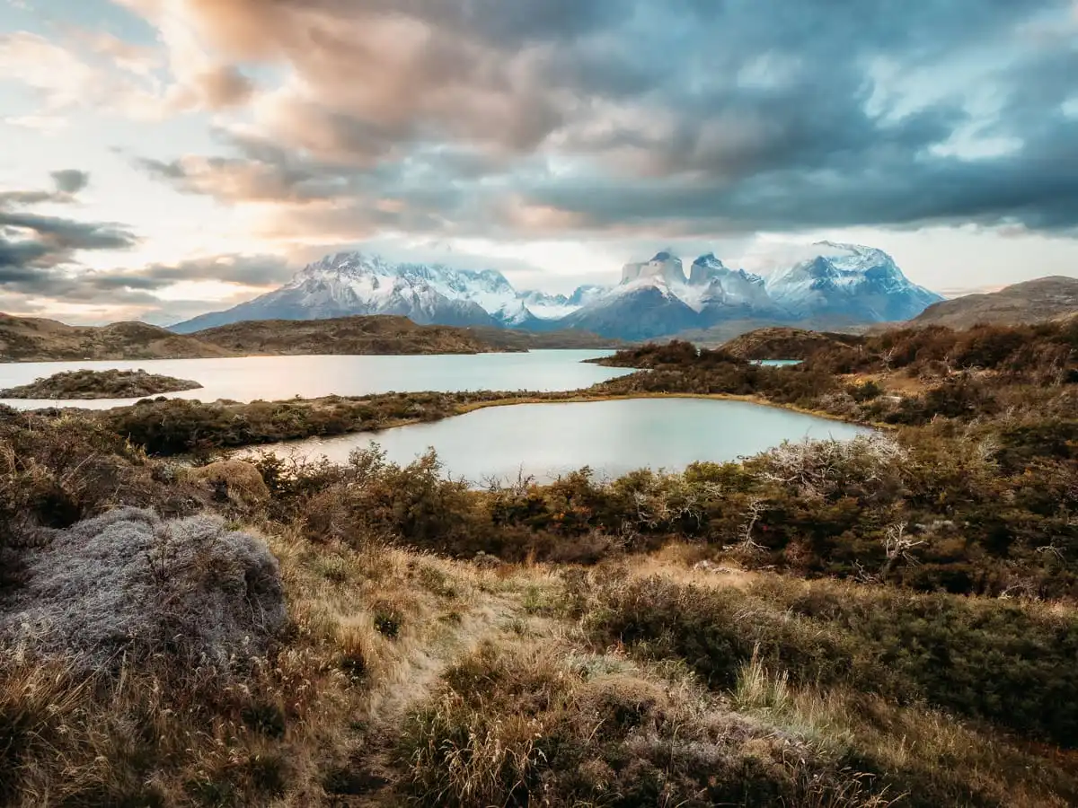 Sunset at Torres del Paine with mountains, lagoons, and clouds