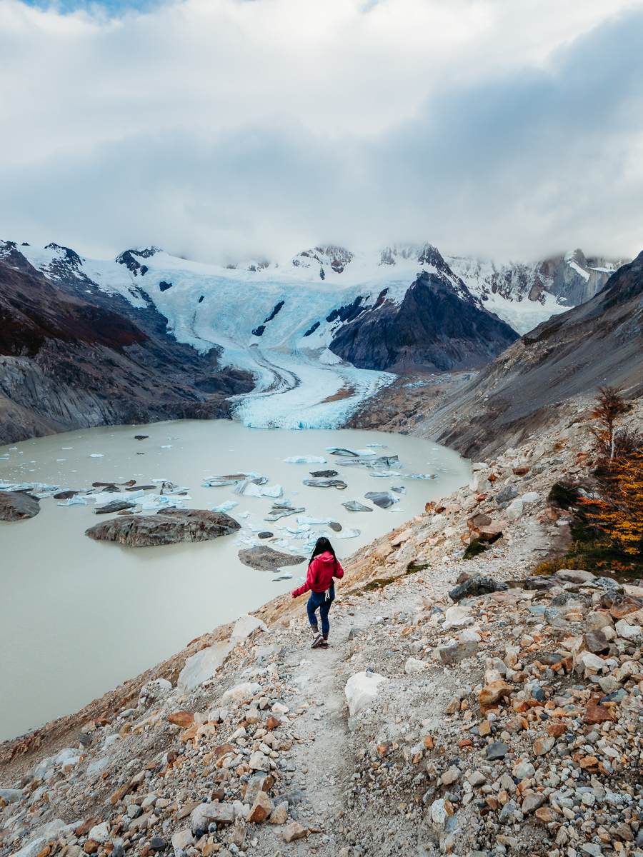 Standing on the hiking trail leading to the icebergs in Laguna Torre hike in Argentina Patagonia