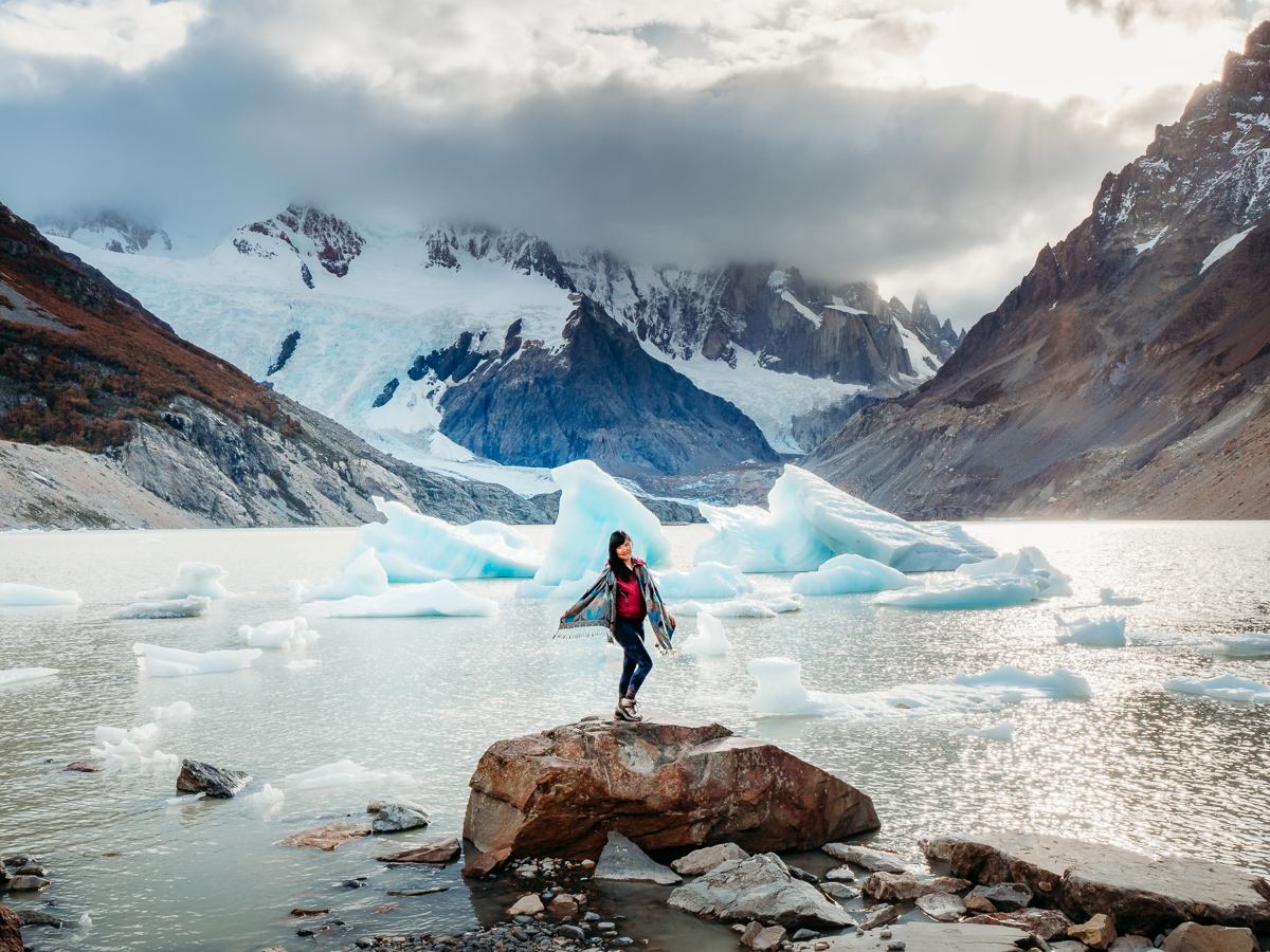 standing in front of icebergs in los glaciares national park