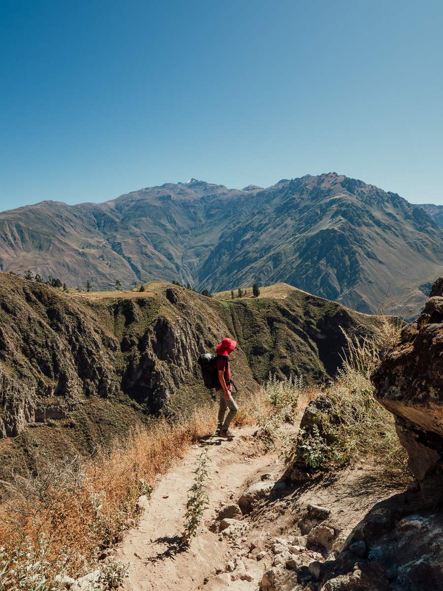 Standing on the trail of Colca Canyon