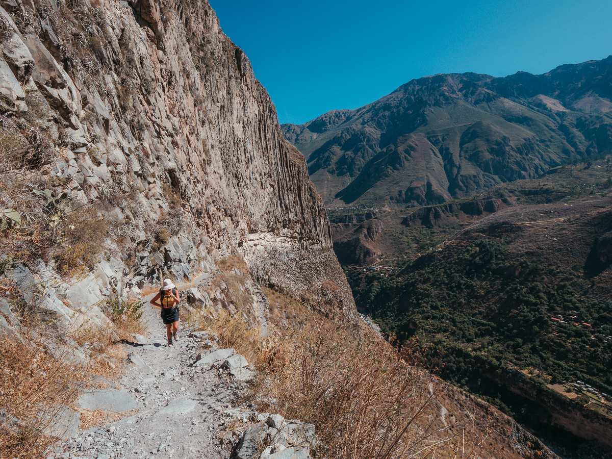 hiking in Colca Canyon Trek with interesting rock formations on the cliff
