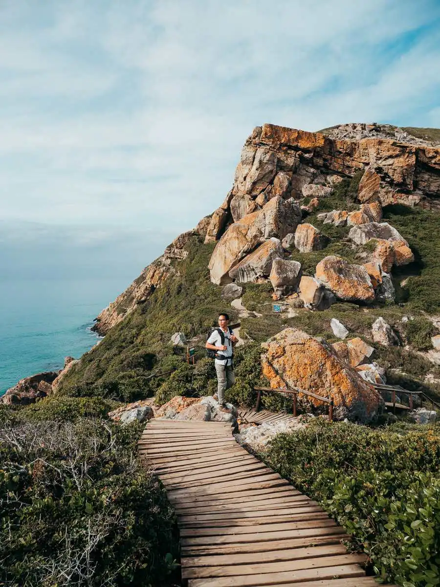 man walking at nature reserve in Garden Route