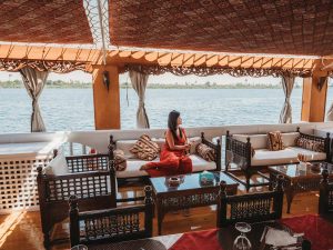 Woman sitting on the sofa on Dahabiya Amoura