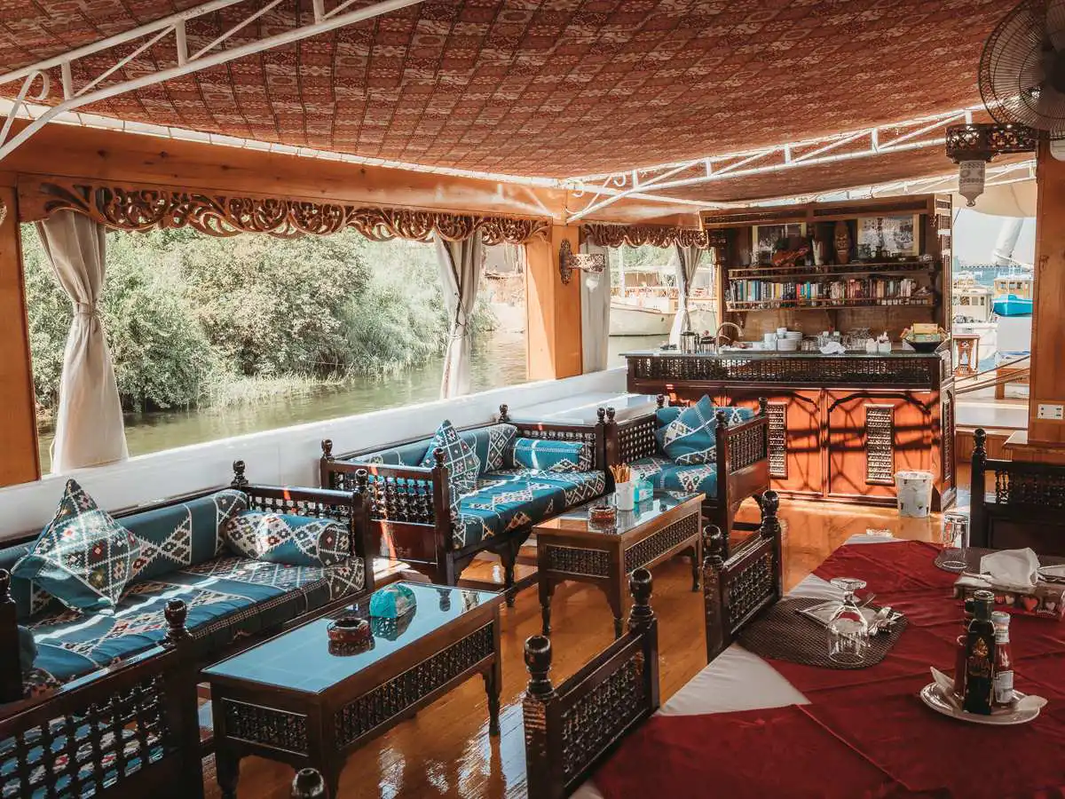 Nile Cruise Dahabiya, view of lounge chairs and bar