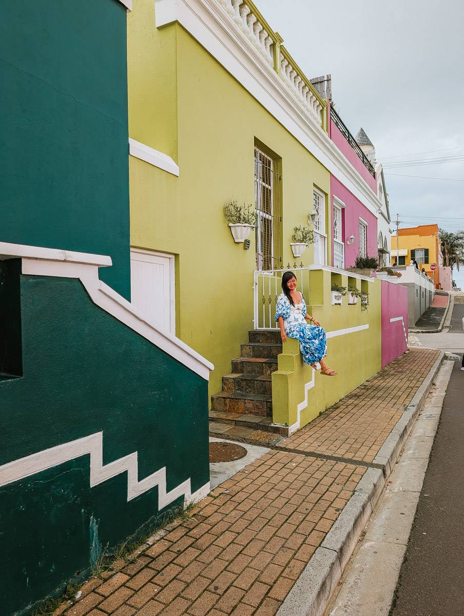 woman sitting on staircase at Bo Kaap