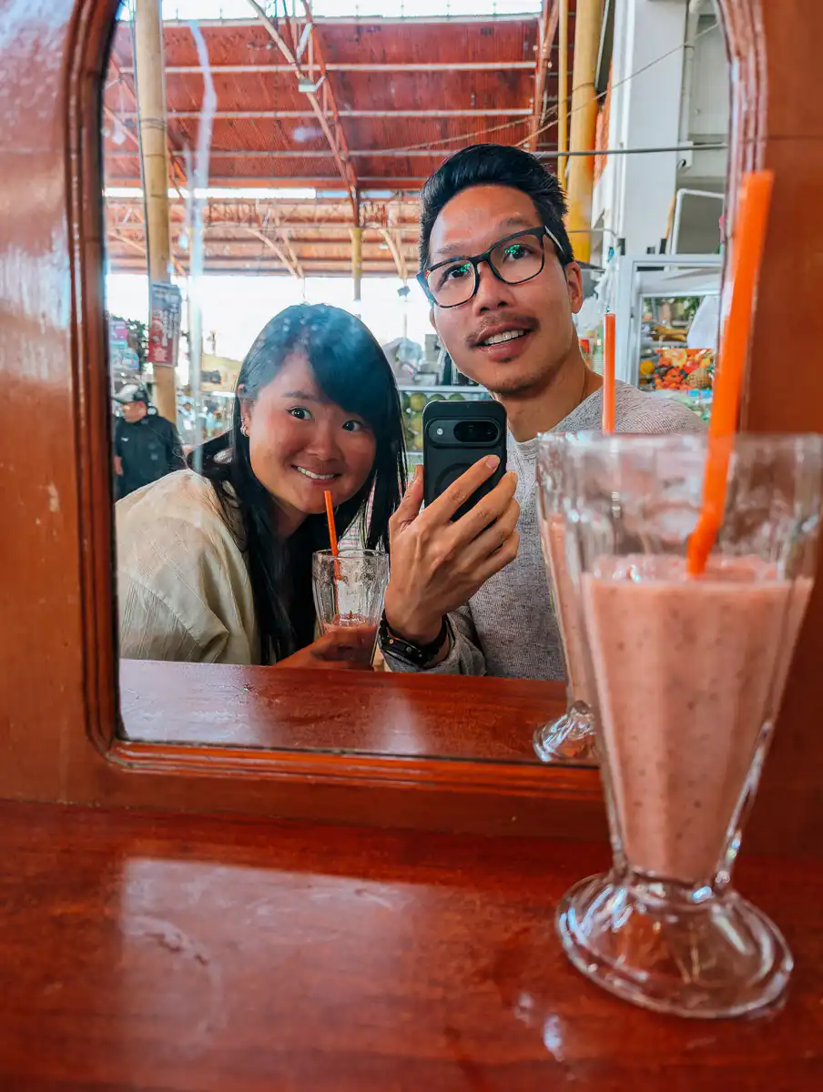 selfie in front of mirror with smoothie juice