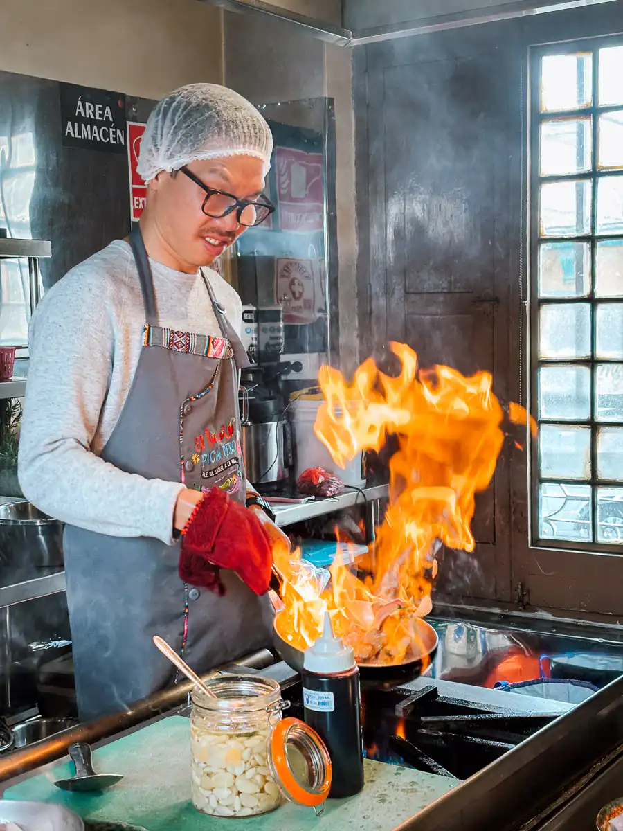 flaming pan while cooking in arequipa